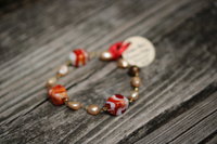 Peach Pearl And Red and White Swirl Glass Roman Inspired Bracelet