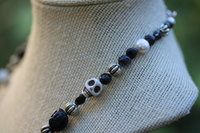 Nine Skulls Necklace with Labradorite, Lava Rock, Pearl, and Metal